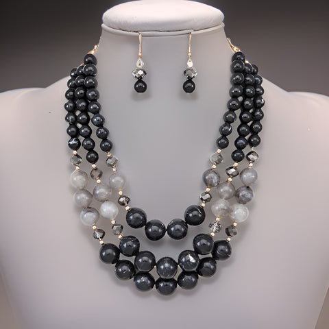 Two Tone Black Layered Beaded Necklace & Earring Set - Premium Fashion Jewelry from MAGOS - Just $16.99! Shop this and more Fashion Jewelry now 